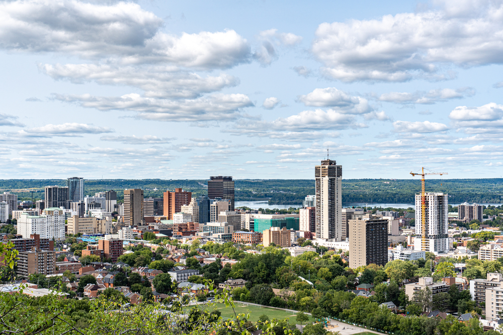 Hamilton Ontario skyline overlay with break-in statistics by ward, 2025 Hamilton Police data